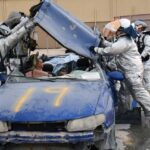 Jaws of Life cutters, a powerful car rescue tool, demonstrated cutting through a car roof during an emergency vehicle extrication exercise.