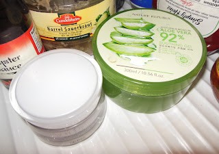 Inside of fridge with skincare products and food items