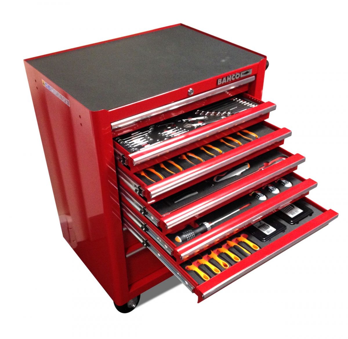 Professional mechanic using a tool chest in a workshop