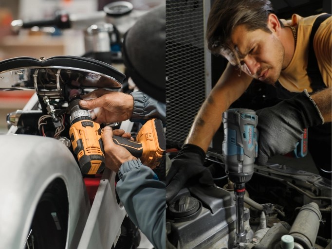 Cordless impact wrench being used to remove a lug nut.